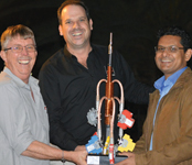 Pictured at the trophy presentation (left to right) Paul van As (Surgetek) Kirk Risch (Dehn Protection South Africa) and Premesh Narismulu (Surgetek).
